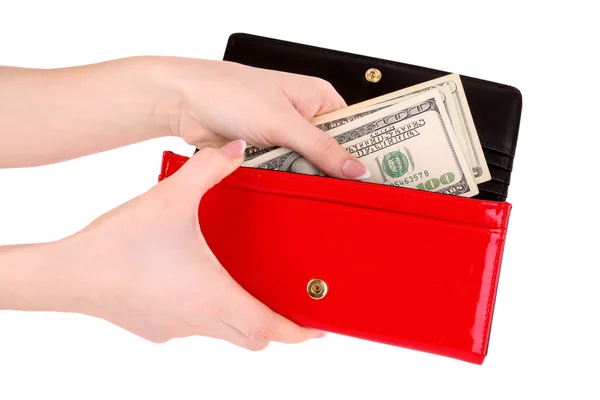 Červená kabelka s dolary v rukou na bílém pozadí — Stock fotografie
