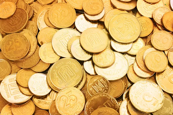 Золотые монеты в качестве фона — стоковое фото