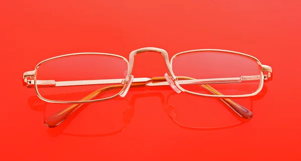 Eyeglasses on the color background — Stock Photo, Image