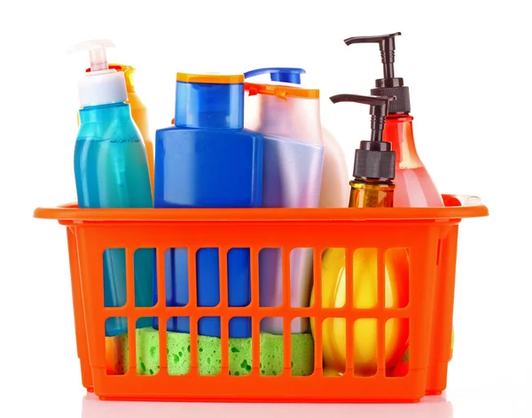 Bottles of beauty and bath products in orange box isolated on wh — Stock Photo, Image