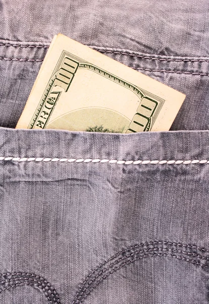 Dollar sedel i jeans fickan — Stockfoto