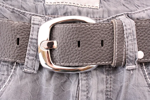 Modré džíny s páskem — Stock fotografie
