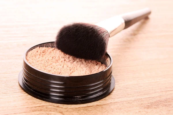 Cosmetic brush and powder — Stock Photo, Image