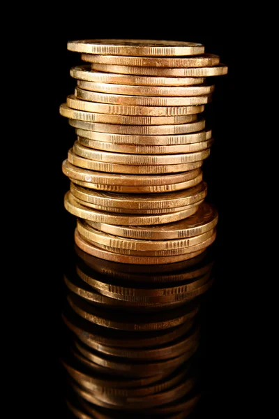 Coins on black background — Stock Photo, Image
