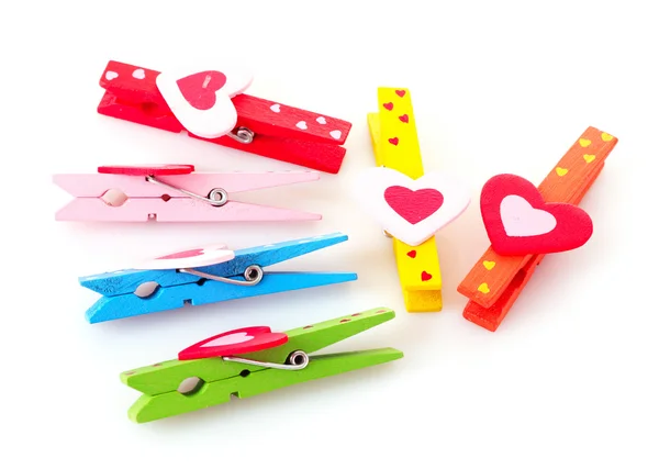 Wooden clothes pins with hearts — Stock Photo, Image