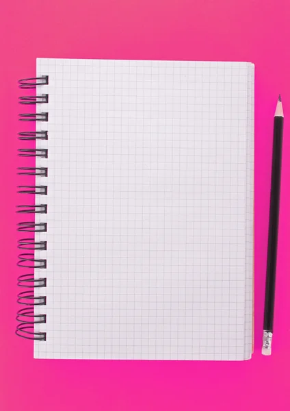 Notebook with pencil on the pink background — Stock Photo, Image