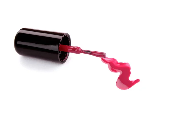 Růžový lak na nehty na bílém pozadí — Stock fotografie