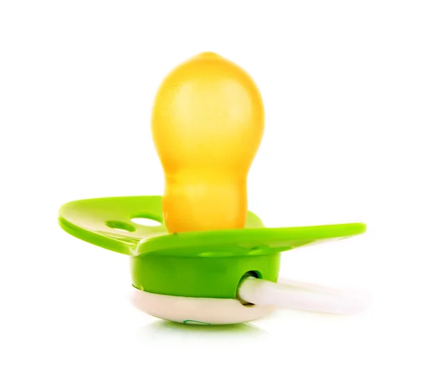 Bebé chupete de silicona en color verde, aislado en fondo blanco —  Fotos de Stock