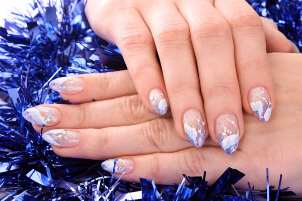 Nails with beautiful winter design on white — Stock Photo, Image