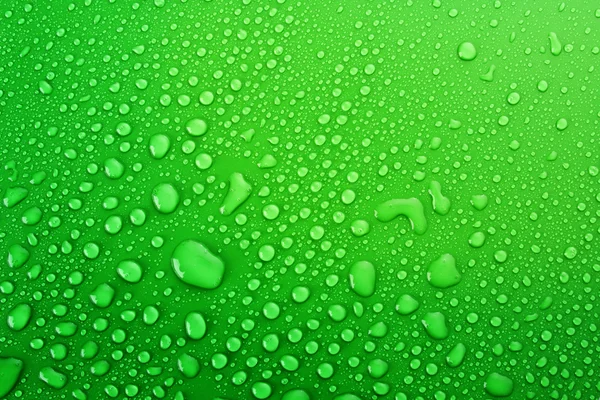Zielone krople wody tło — Zdjęcie stockowe