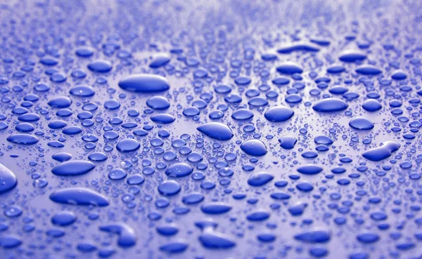 Gouttes d'eau bleue fond — Photo