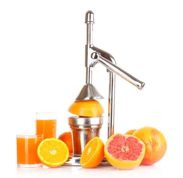 Juicer och apelsiner på vit bakgrund — Stockfoto