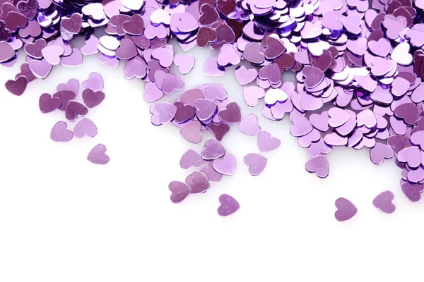 Fialové srdce v podobě konfety na bílém pozadí — Stock fotografie