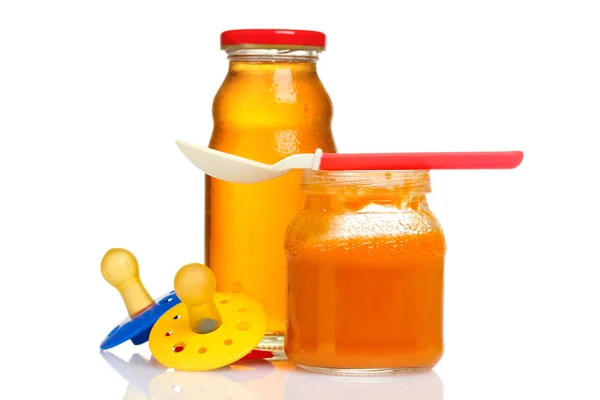 Baby food and spoon — Stock Photo, Image