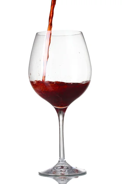 Rött vin häller i glas — Stockfoto