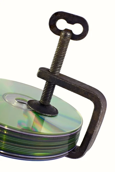 クランプによって押される cd ディスクの束 — ストック写真