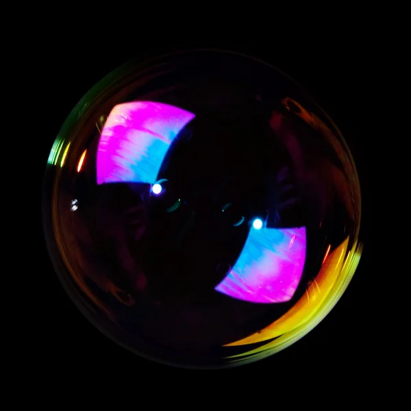 stock image Soap bubble on black