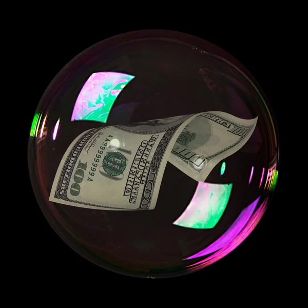 Hundred dollar bill into bubble on black — Stock Photo, Image