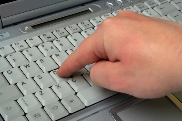 Laptop dedo — Fotografia de Stock
