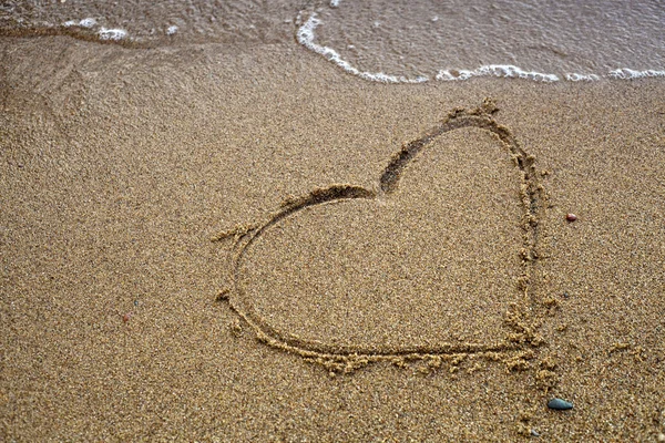 stock image Heart on the sand and wave