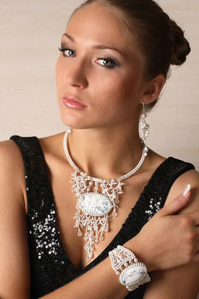Beautiful portrait of woman with jewelry — Stock Photo, Image